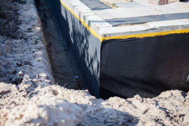 Professional Waterproofing technician working in McDonough, GA